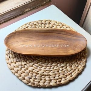 Oval wooden plate made from solid wood with a smooth hand-finished surface, showcasing natural wood grain for serveware, kitchen decor, or hospitality use.