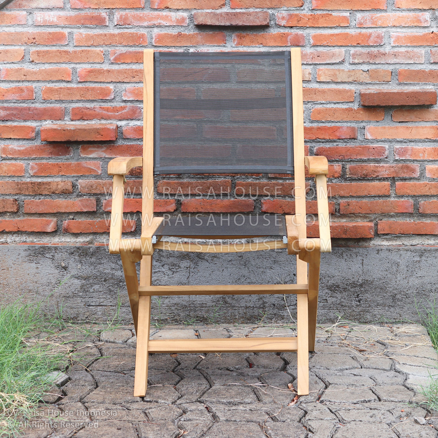 The Anson folding armchair is made from premium teak wood and Batyline mesh - made by an Indonesian furniture manufacturer.