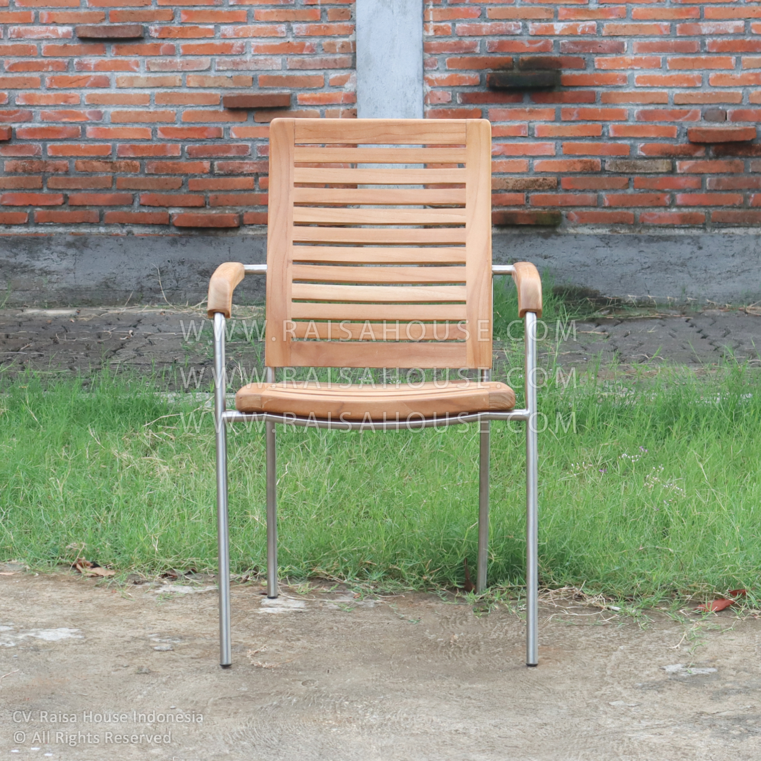 Hampton Curve Armchair made from durable teak wood for outdoor use, featuring elegant curved lines and comfortable seating.