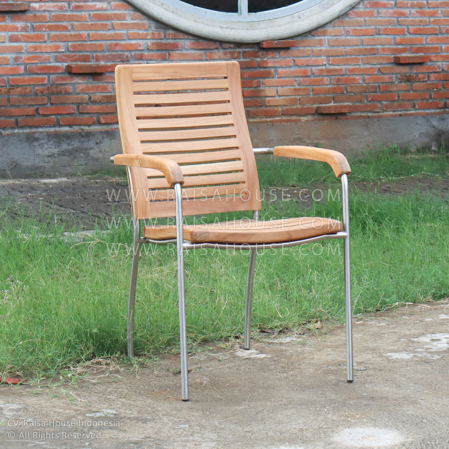 Hampton Curve Armchair made from durable teak wood for outdoor use, featuring elegant curved lines and comfortable seating.