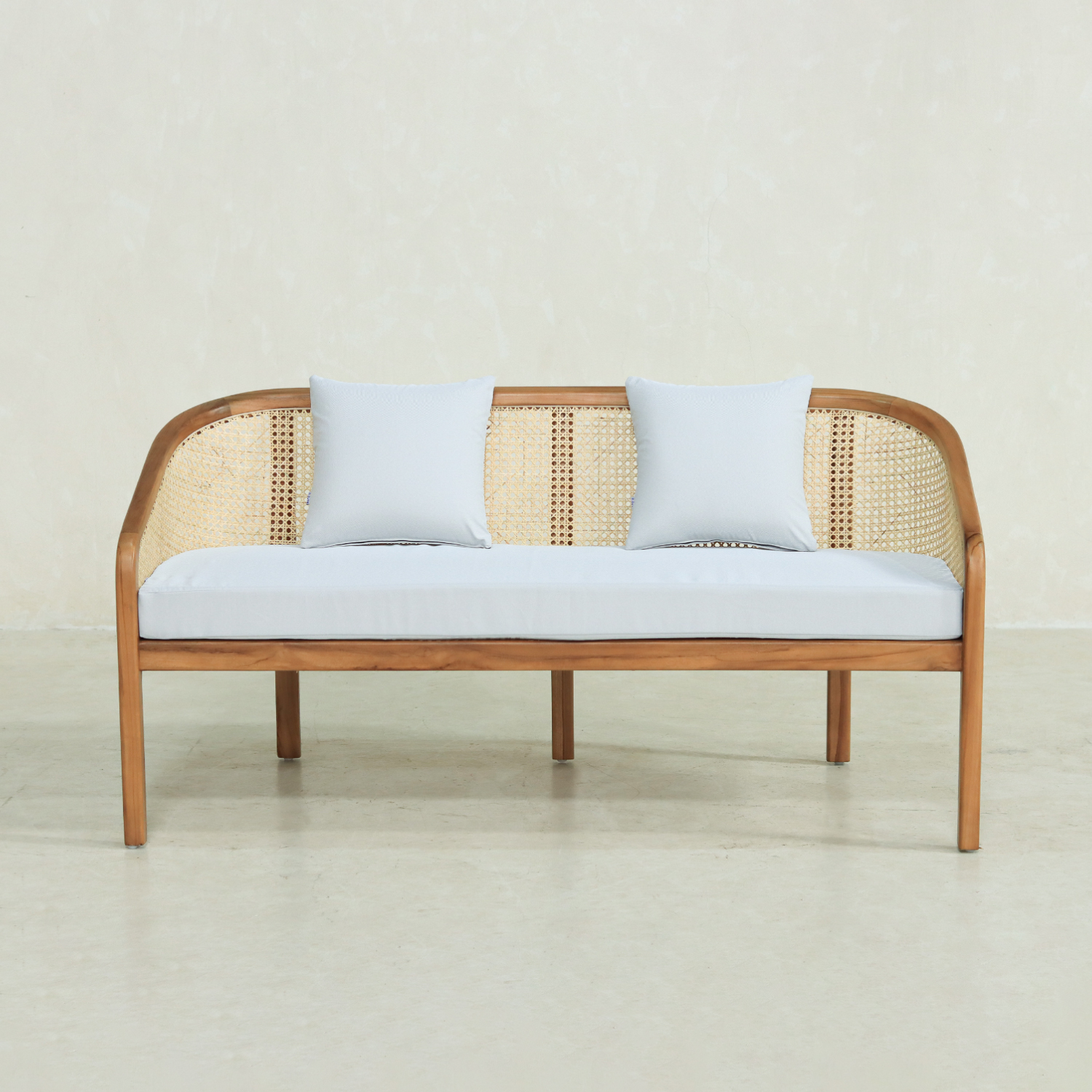 Lounge Hoffman Sofa with rattan backrest and solid teak frame, designed by Indonesia furniture manufacturers for hotel, resort, and project use.