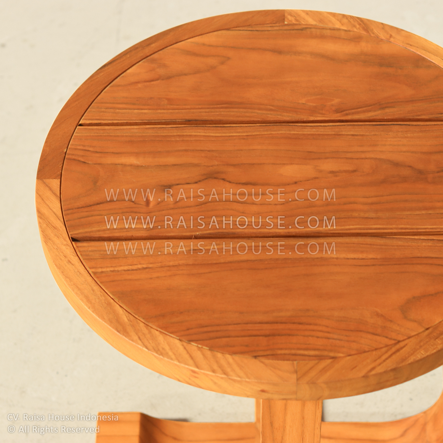Round teak wood side table with modern cross base, handcrafted by Indonesia furniture manufacturers – perfect for cafes, hotels, and commercial lounges.